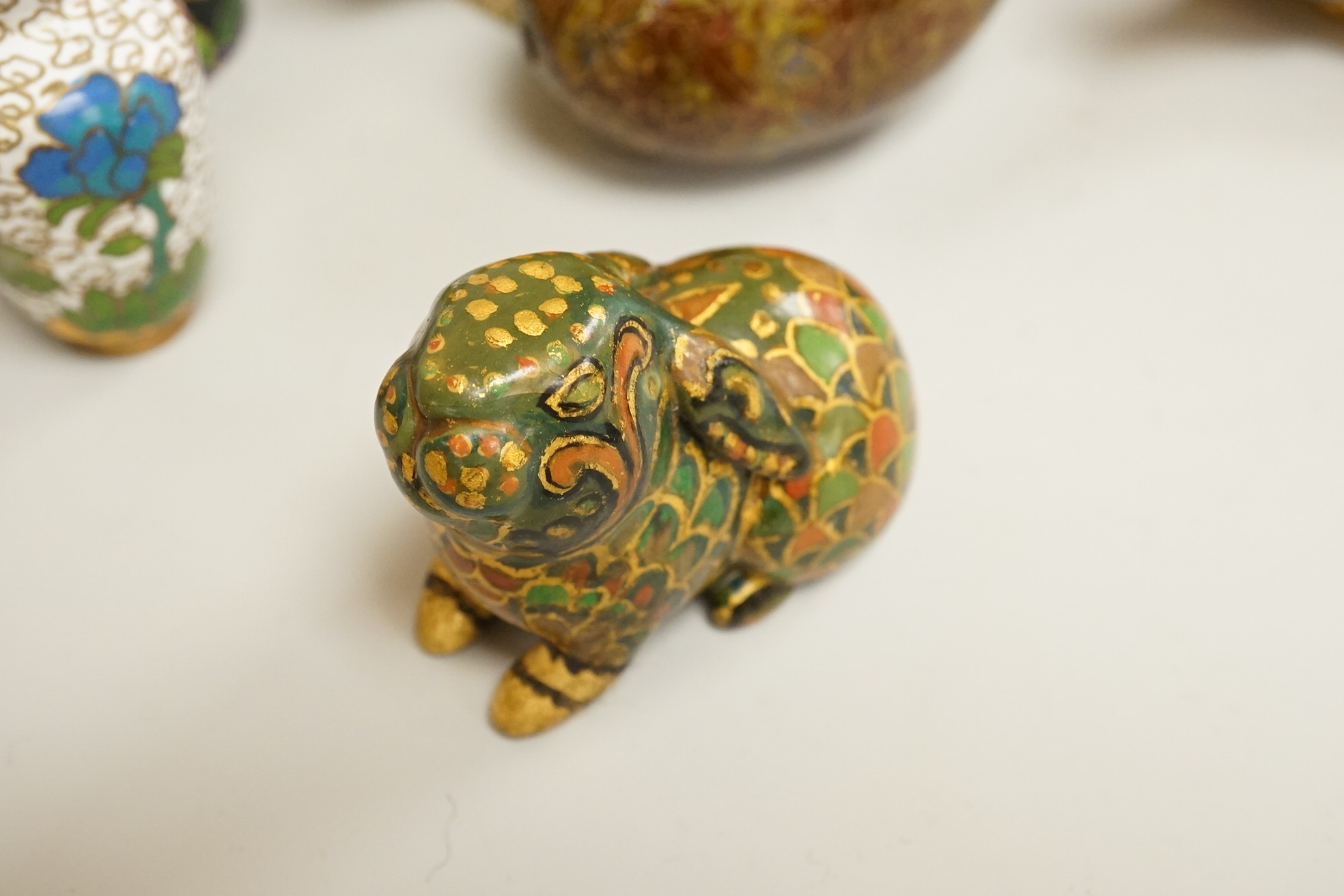 A collection of miniature enamel and cloisonné boxes, eggs and a painted rabbit, etc. (11)